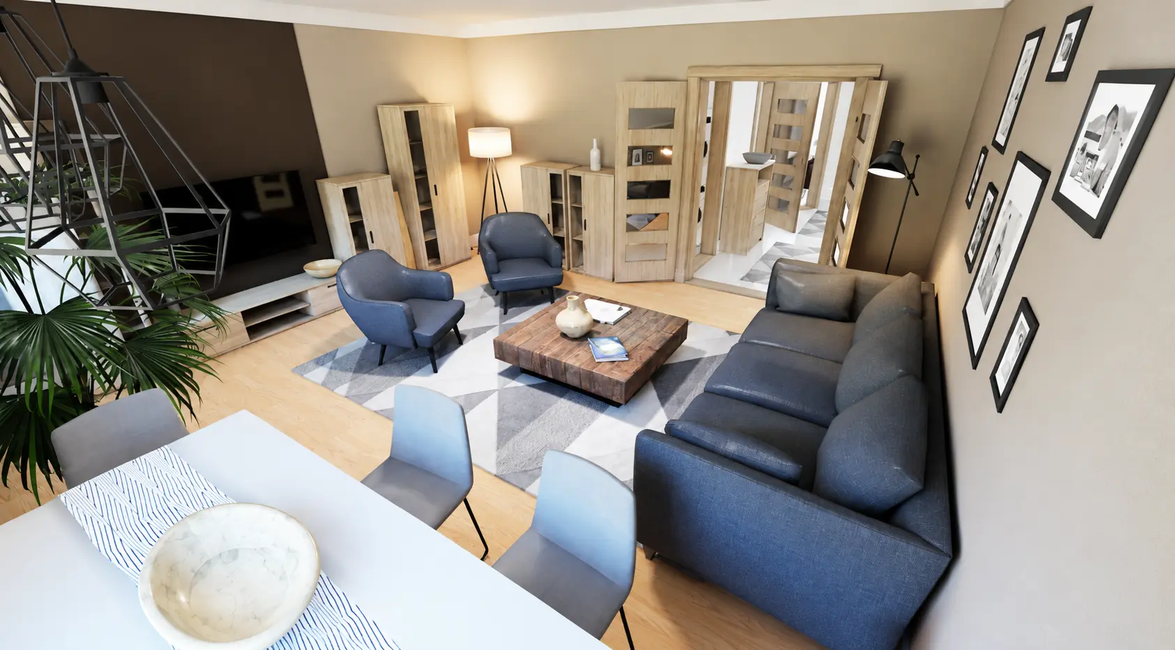 Open-plan living and dining area with grey sofa and framed prints